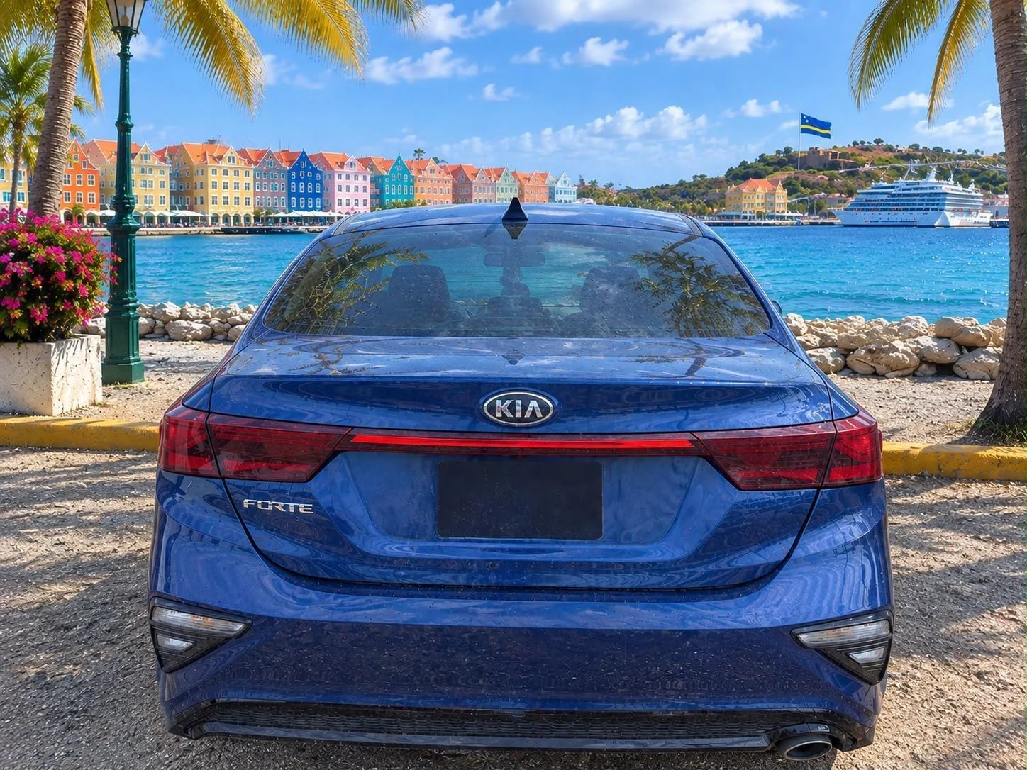 Blue Kia Forte sedan, rear view