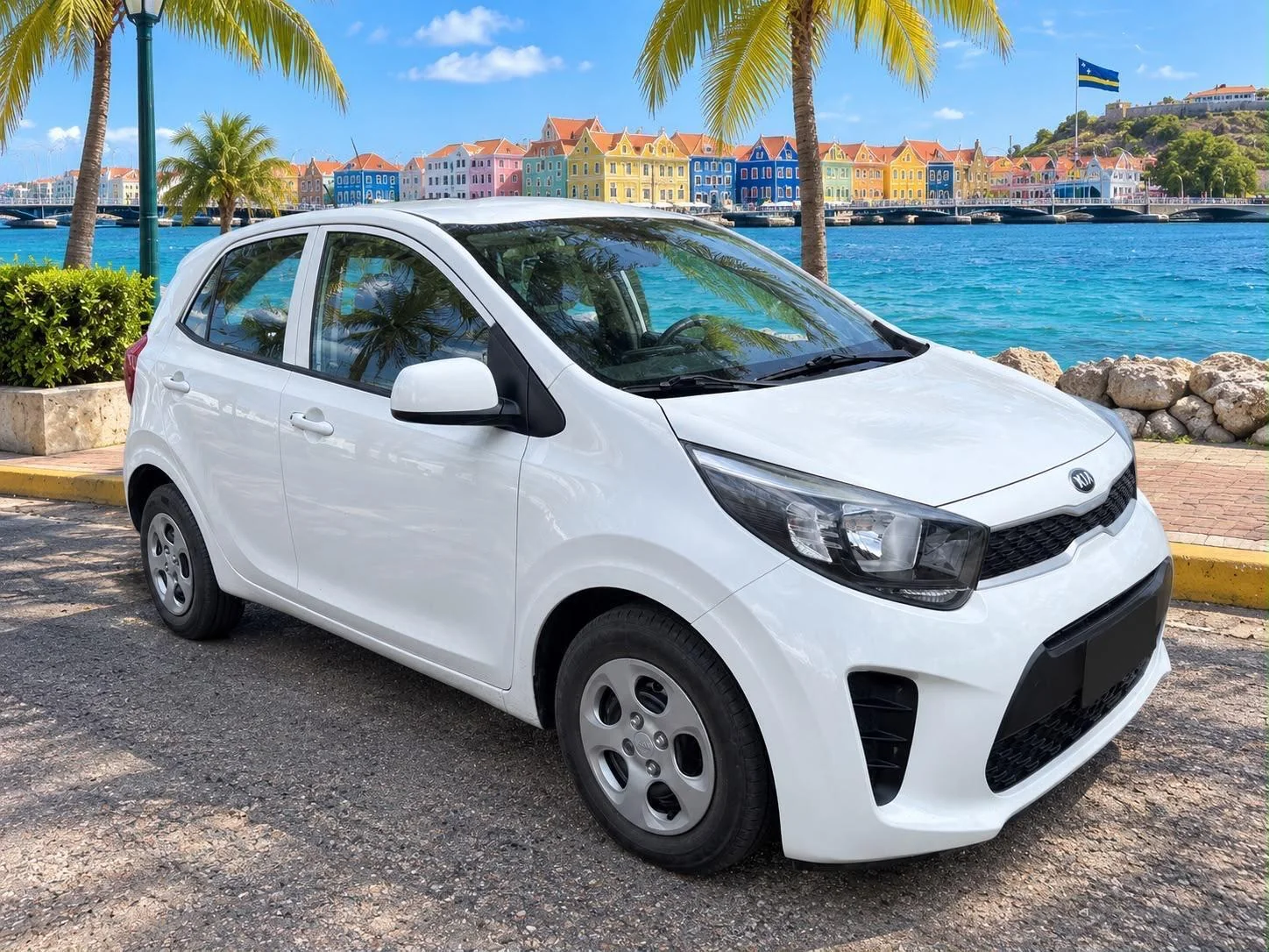 White Kia Picanto, front three-quarter view