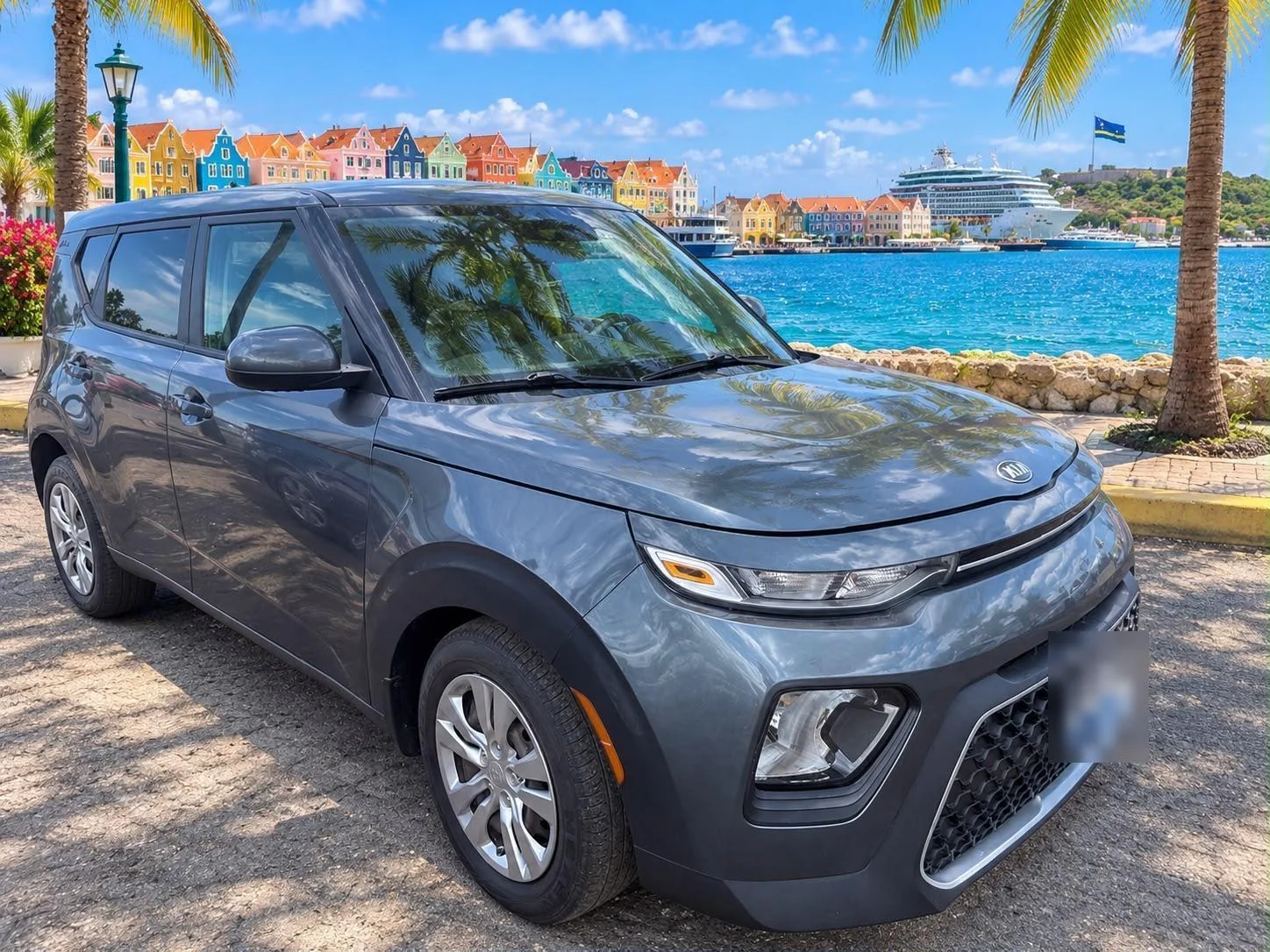 Grey Kia Soul, front three-quarter view