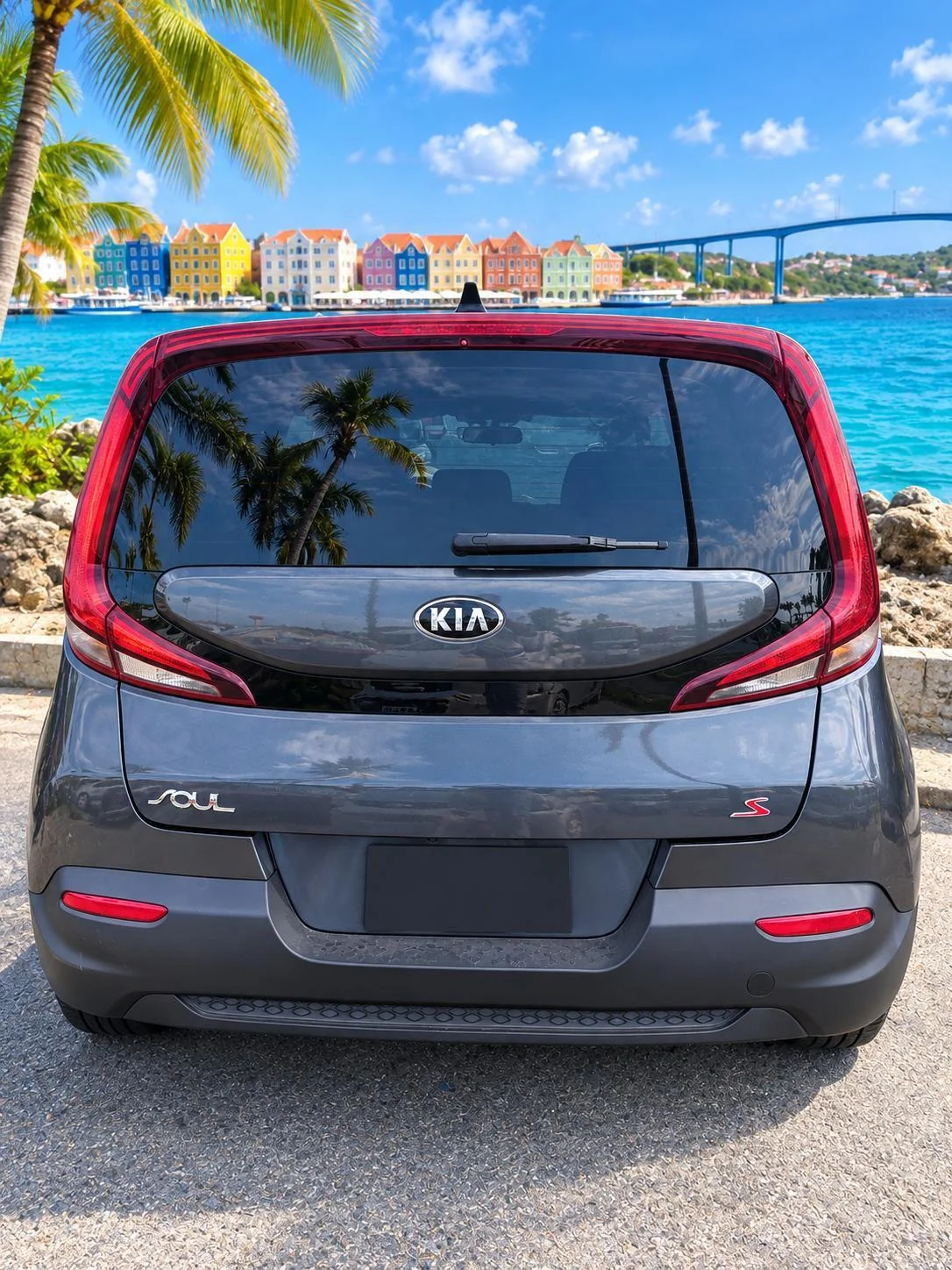 Grey Kia Soul, rear view