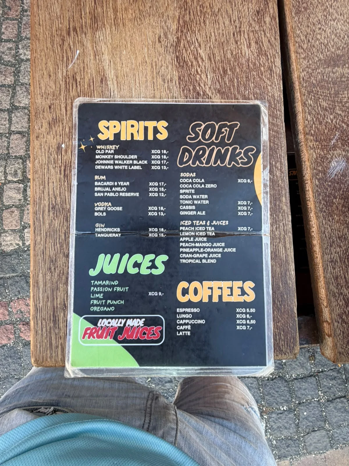 BRGR Haus drinks card listing spirits, soft drinks, locally made juices and coffees.